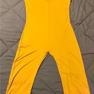 Vibrant Yellow Skinny Jumpsuit with High Neckline